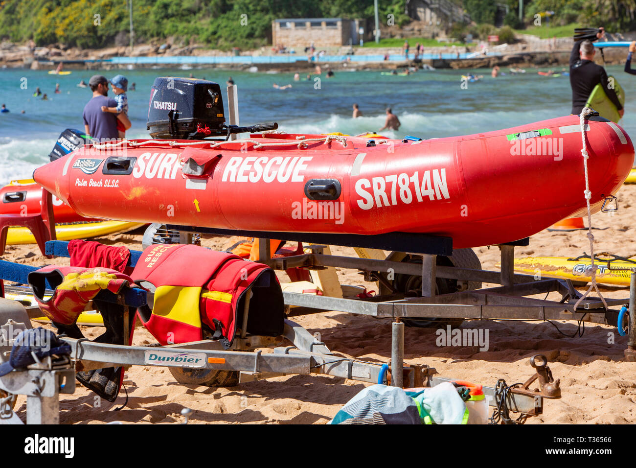 Surf rescue lifeguard equipment including dinghy with outboard and