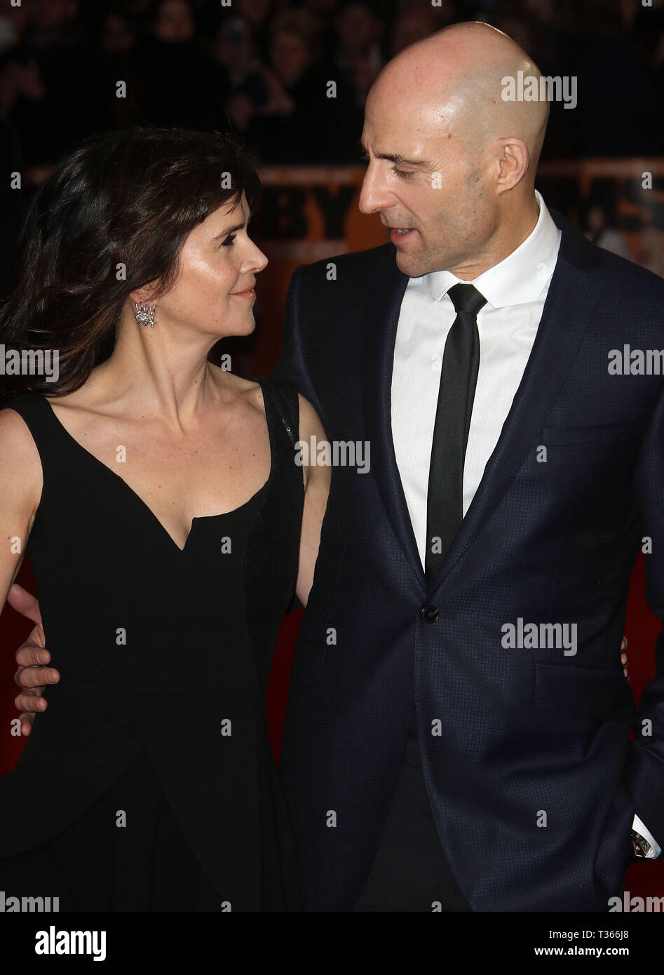 Feb 22, 2016 - London, England, UK - 'Grimsby' World Premiere, Odeon Leicester Square - Red Carpet Arrivals Photo Shows: Liza Marshall, Mark Strong Stock Photo