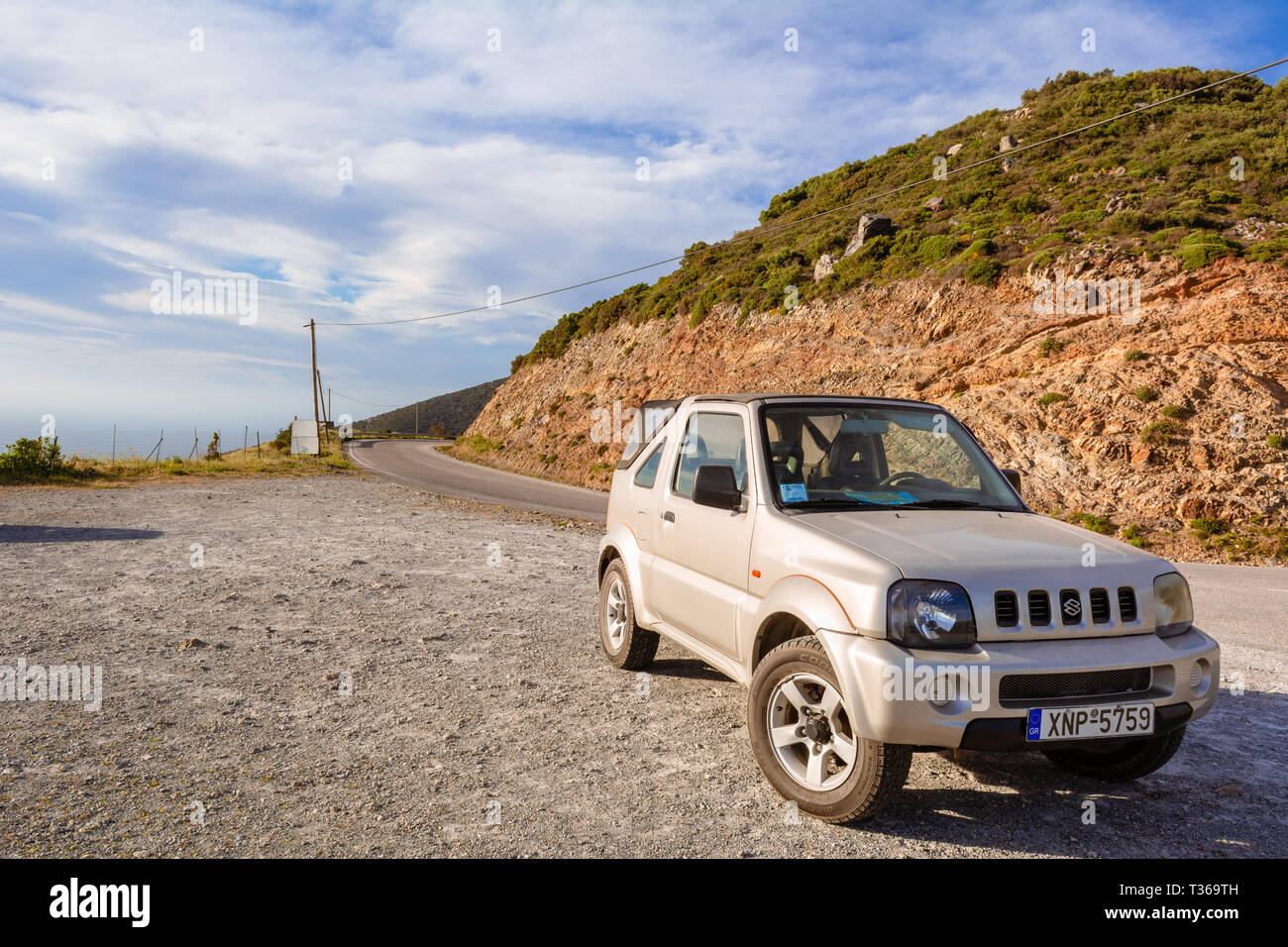 CRETE, GREECE - May 2, 2015: Suzuki Jimny car parked on road at west coast of Crete. Greece Stock Photo