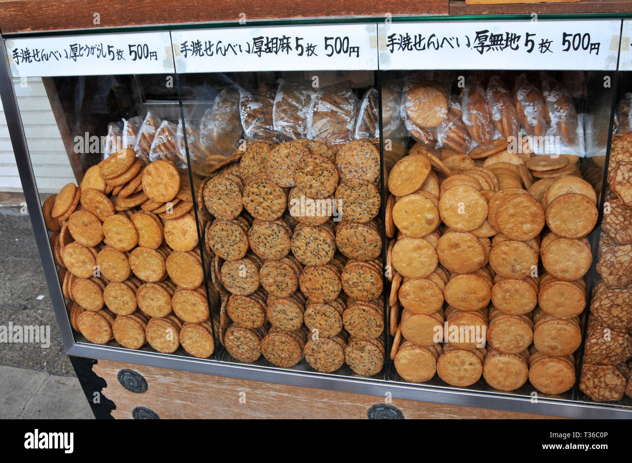Tokyo, Japan - 12th July 2018 : View of a typical Japanese rice cookies stall located in the Nakamise shopping street in Asakusa - Tokyo, Japan Stock Photo