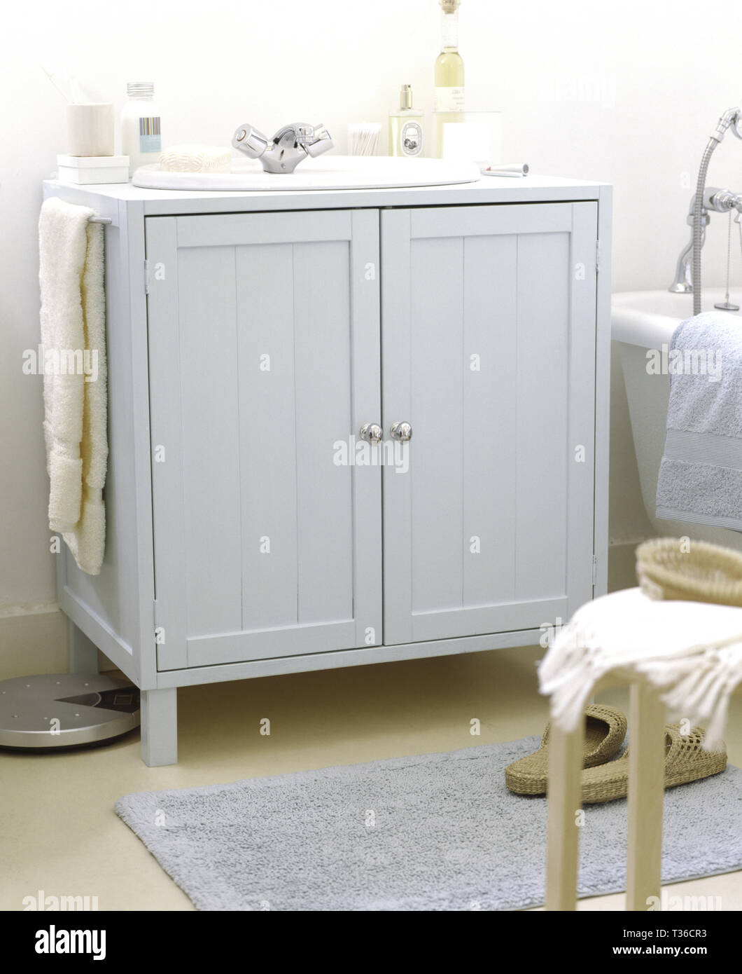 Basin in painted wooden vanity unit Stock Photo Alamy