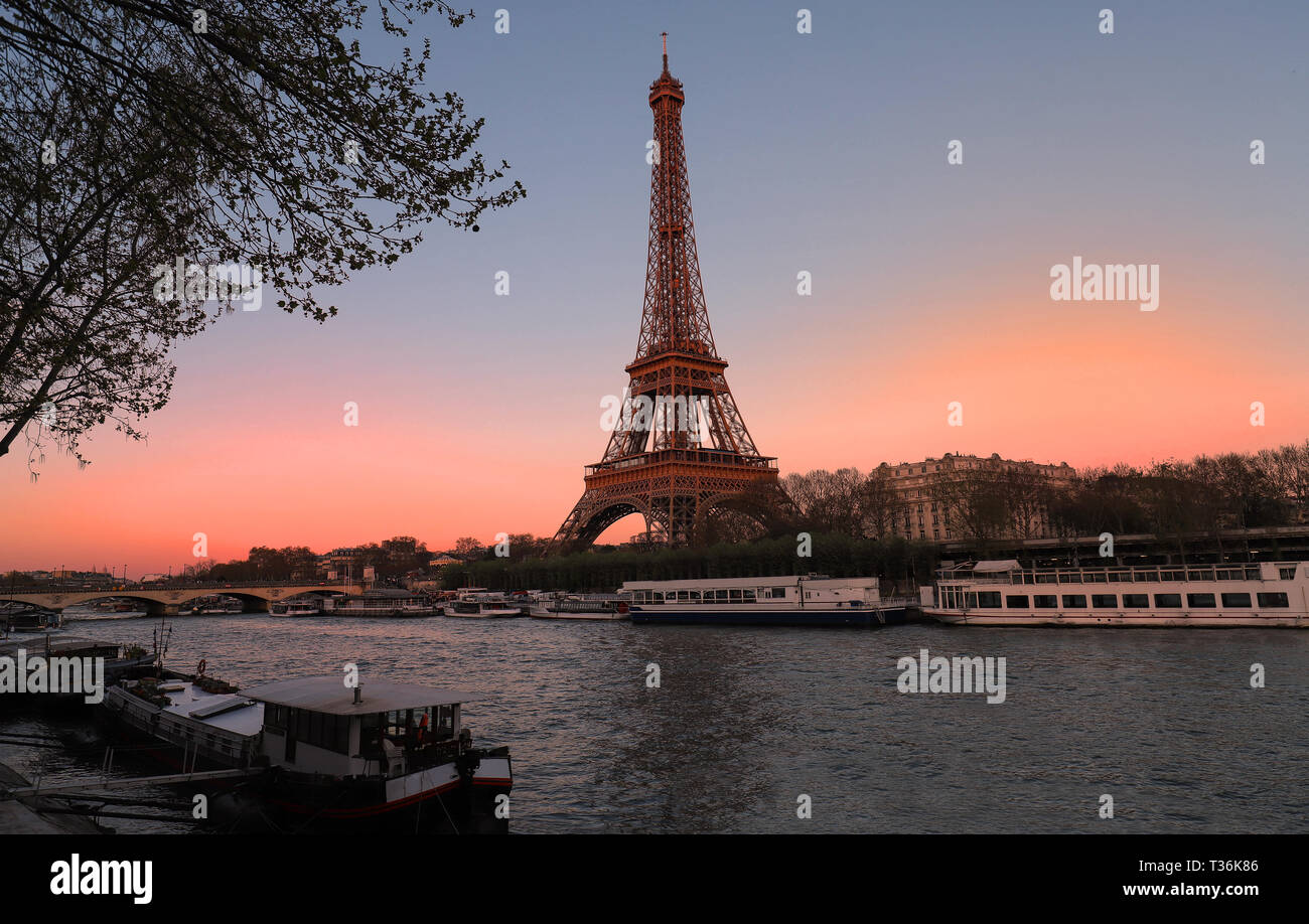 The Eiffel Tower at Sunset, Paris, France.It is the most popular travel place and global cultural icon of the France and the world. Stock Photo