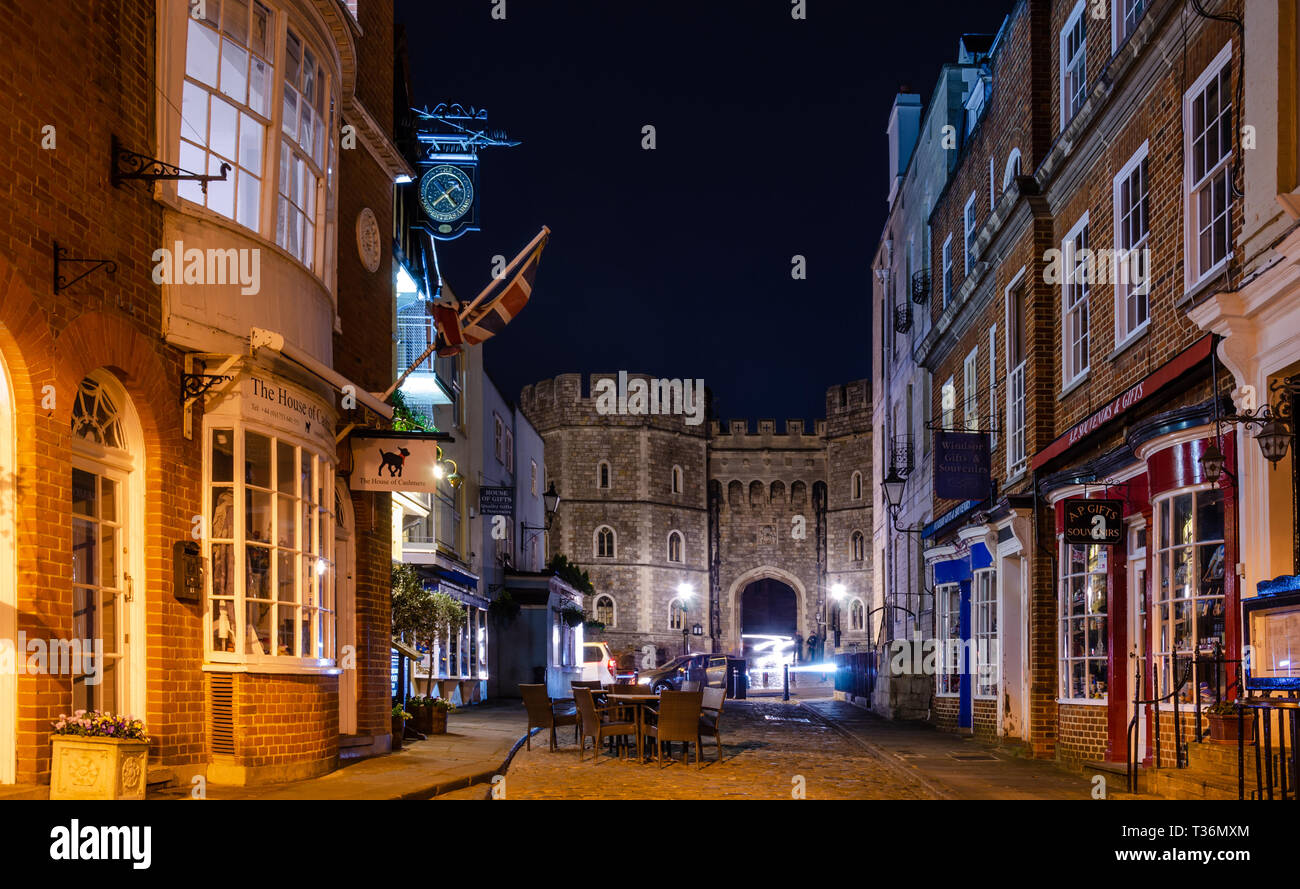 A view down Church Street in Windsor looking towards The King Henry VIII Gateway, one of the entrances into Windsor Castle. Stock Photo