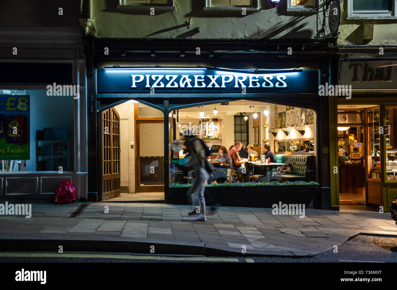 Pizza Express on Thames Street in Windsor at night. Stock Photo