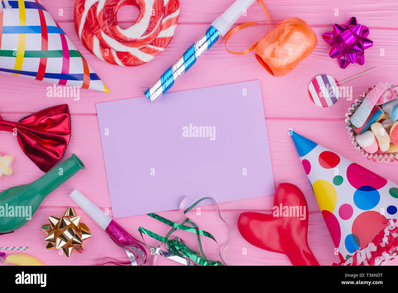 Birthday party accessories. Colorful party items and blank paper card