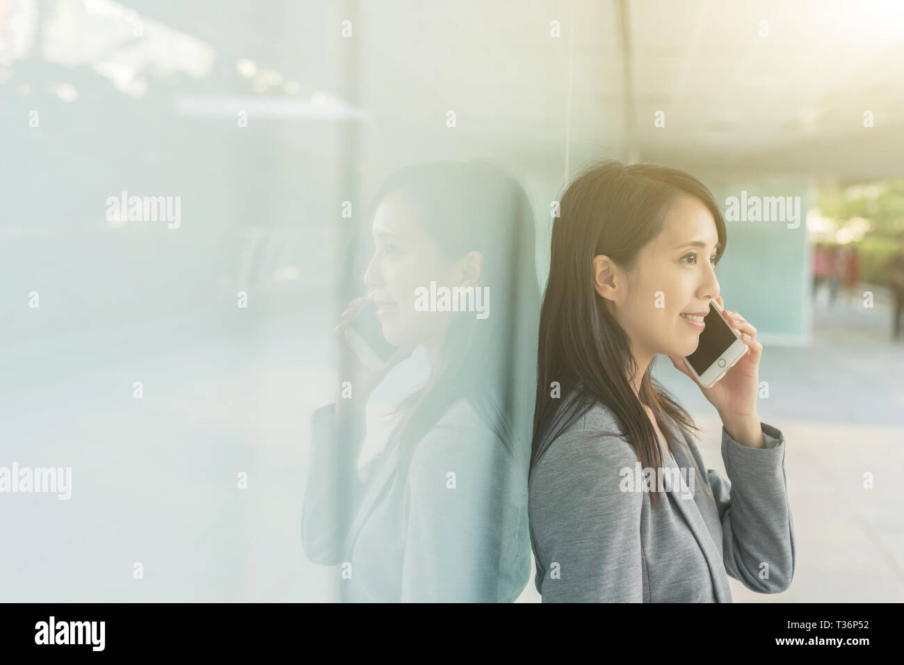 business woman talk on phone at city, bangkok, asia Stock Photo