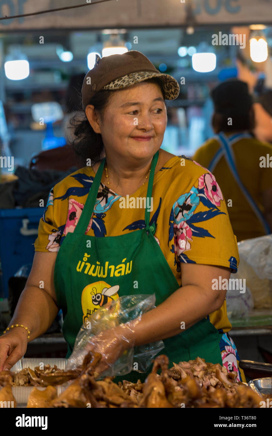 A Thai Lady Or Woman On A Thailand Street Food Stalll At A Market