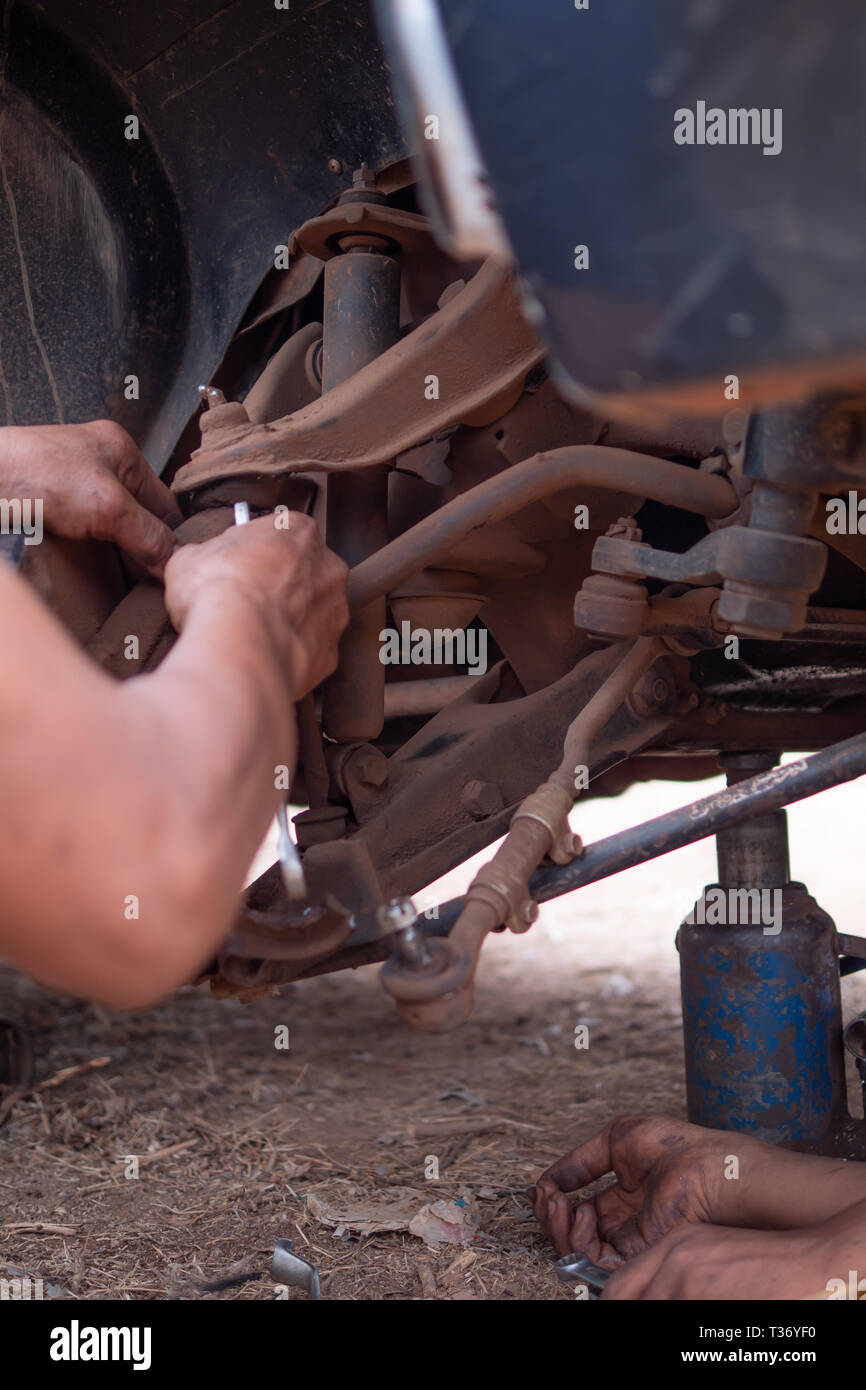 Mechanic fixing truck hires stock photography and images Alamy