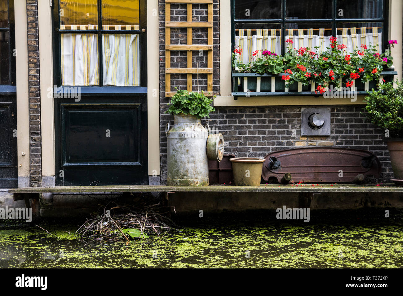 Picturesque house one Dutch canal. Stock Photo