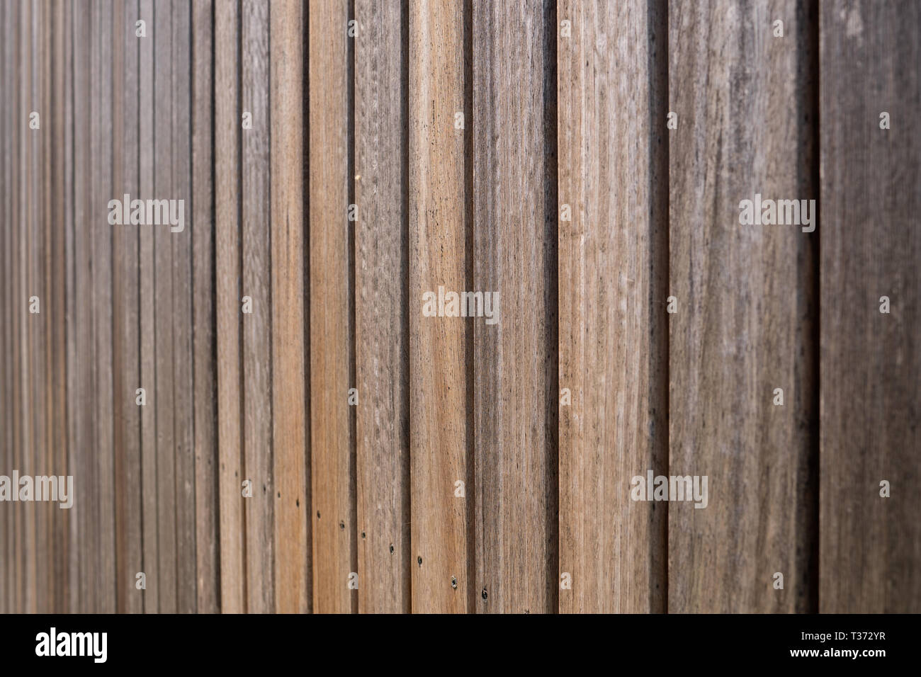 Weathered Wood Panel Texture Background Wall Cladding Made Of Aged Iroko Wood Planks Stock Photo Alamy