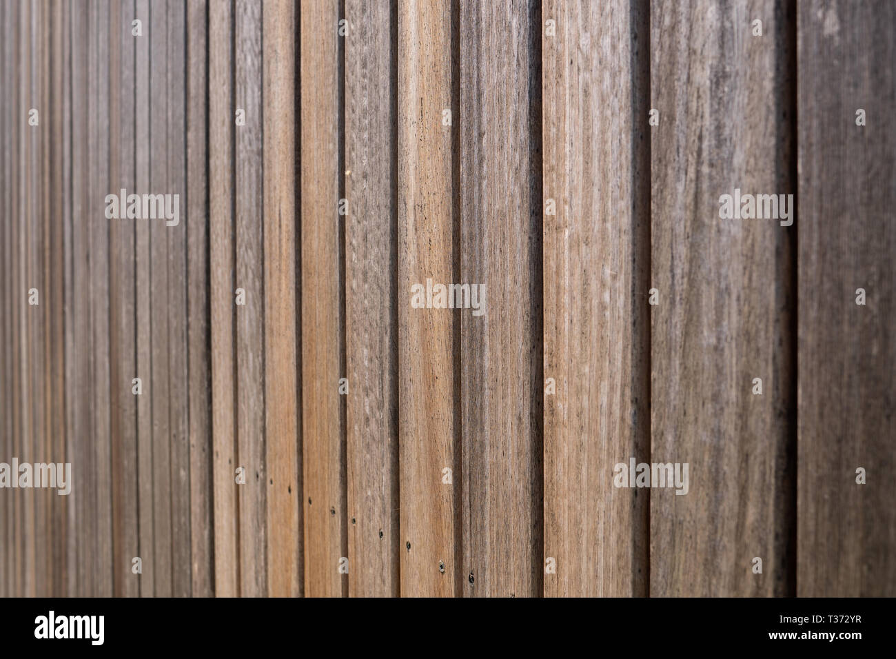 Weathered Wood Panel Texture Background Wall Cladding Made Of Aged Iroko Wood Planks Stock Photo Alamy Weathered Wood Panel Texture Background Wall Cladding Made Of Aged Iroko Wood Planks Stock Photo Alamy