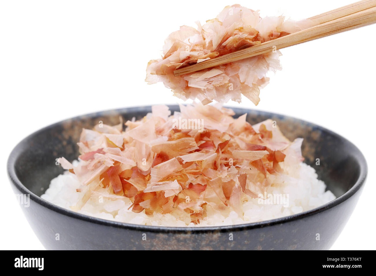 Japanese food, Katuobushi on cooked white rice on white background Stock Photo