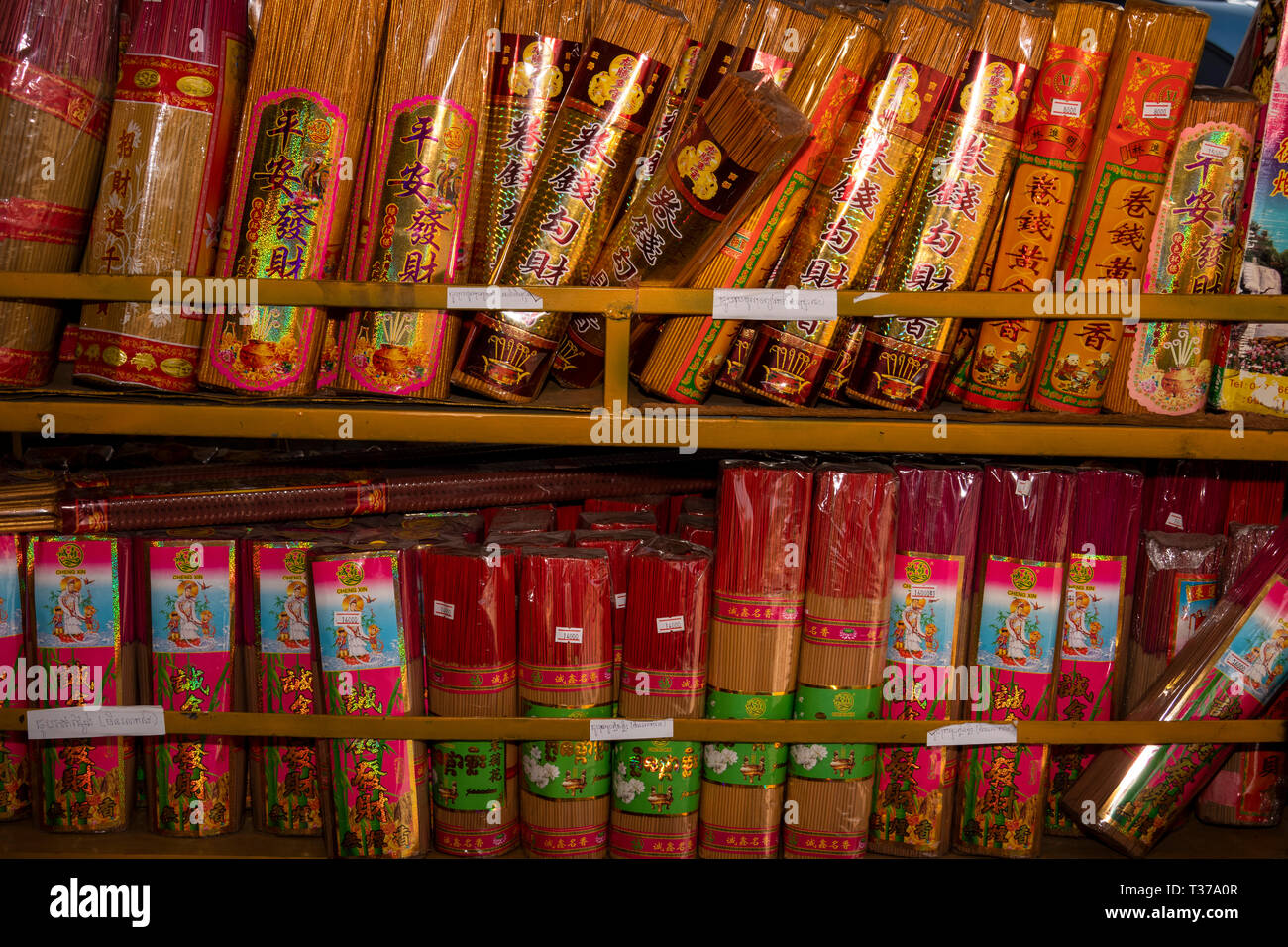 Cm870Cambodia, Kampong (Kompong) Cham, town centre, Psar Thmei, central market, Chinese made insense sticks for sale Stock Photo