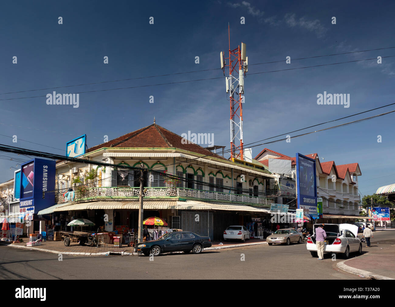 Cambodia, Kampong (Kompong) Cham, town centre, old French colonial building on street corner Stock Photo
