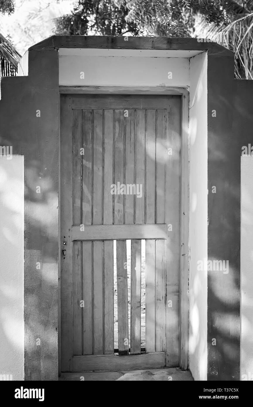 Wooden door of a maldivian house - Black and white (Ari Atoll, Maldives) Stock Photo