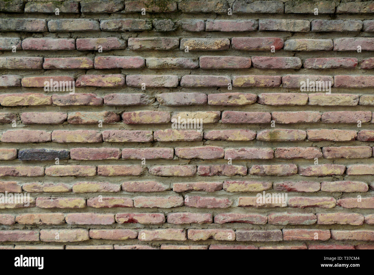 Old grunge brick wall as a background Stock Photo - Alamy
