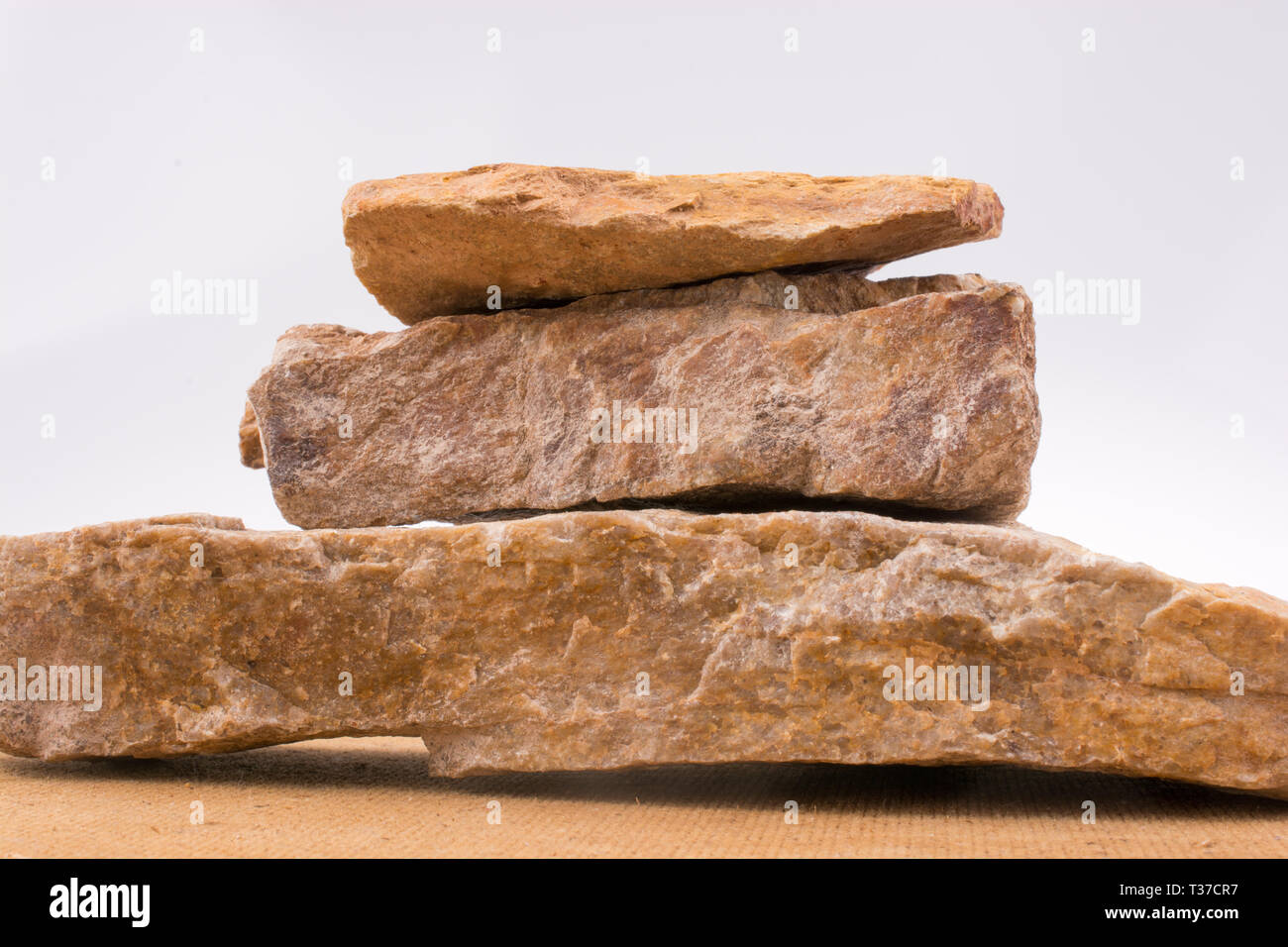 Rocks overlapped on a white background Stock Photo - Alamy