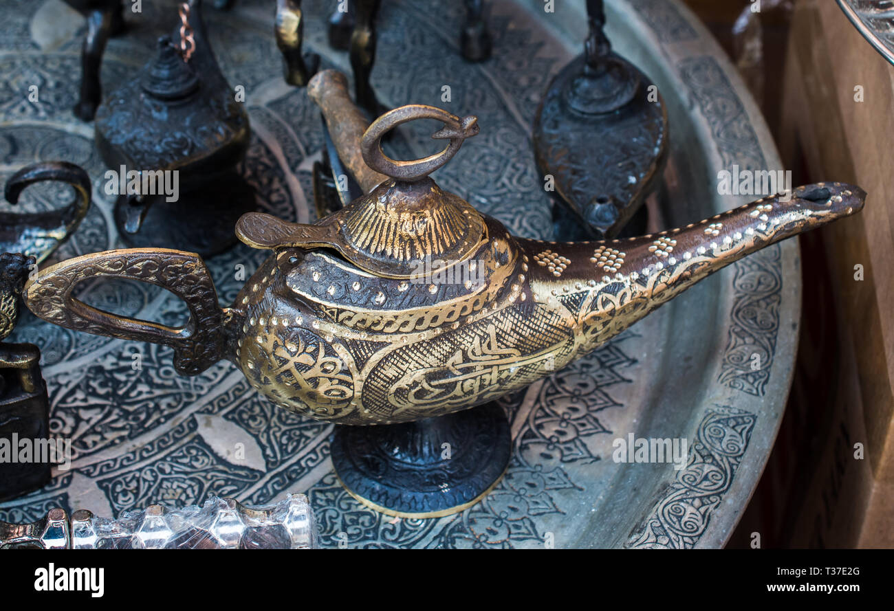 Aladdin lamp of wishes in metal with patterns in view Stock Photo