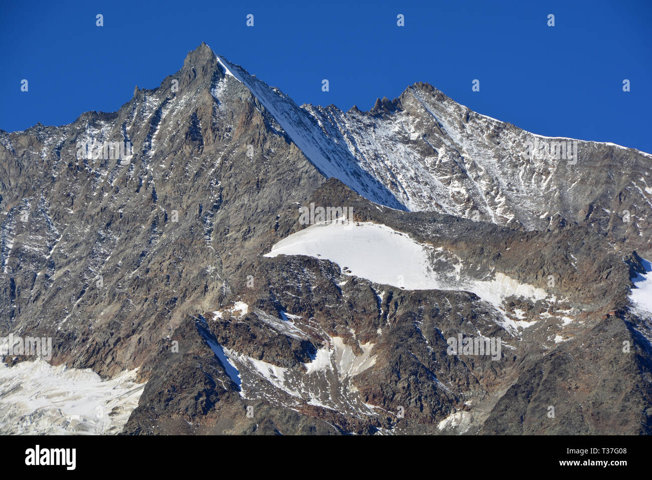 East Face of the Lenzspitze (left) and Nadelhorn in the Swiss Alps above Saas Fee Stock Photo