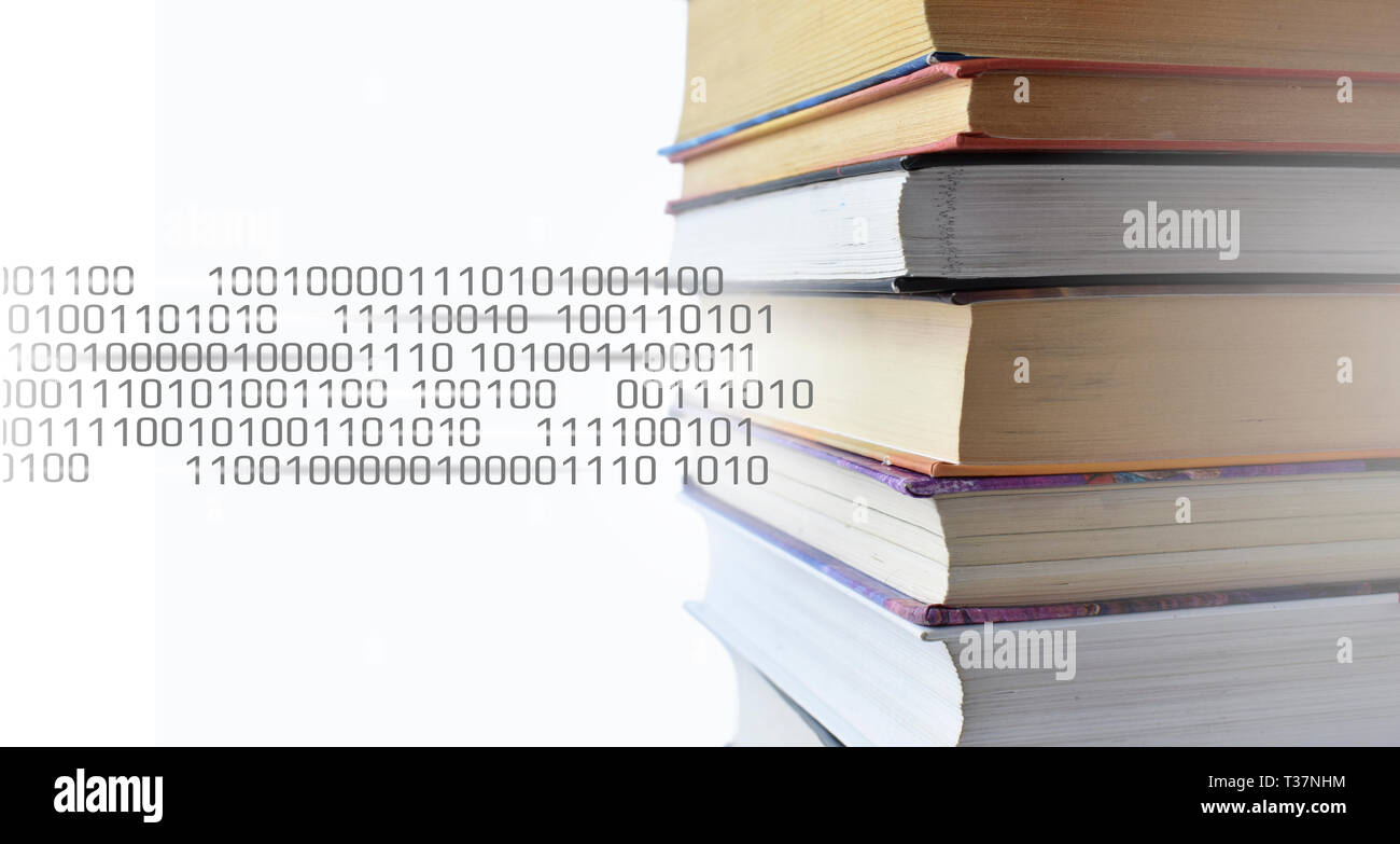 Stack of multicolored books. Old textbooks stacked on each other. Online education technology concept. E-learning training skill courses. Binary code Stock Photo