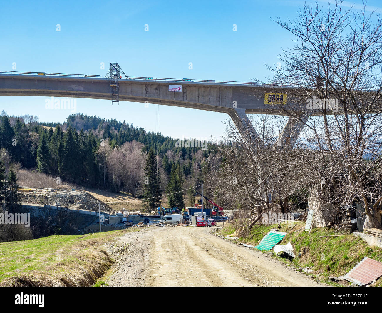 Skomielna Biala, Poland - March 27, 2019: New highway in national road no 7, E77, called zakopianka, under construction. The viaduct over  the village Stock Photo