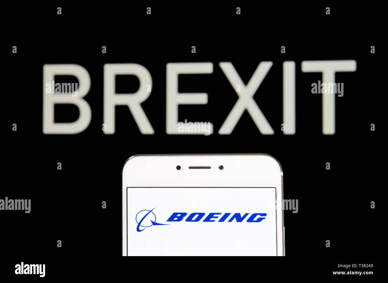 Hong Kong. 6th Apr, 2019. In this photo illustration a American multinational air planes manufacturer Boeing logo is seen on an Android mobile device with a Brexit message in the background. Credit: Budrul Chukrut/SOPA Images/ZUMA Wire/Alamy Live News Stock Photo