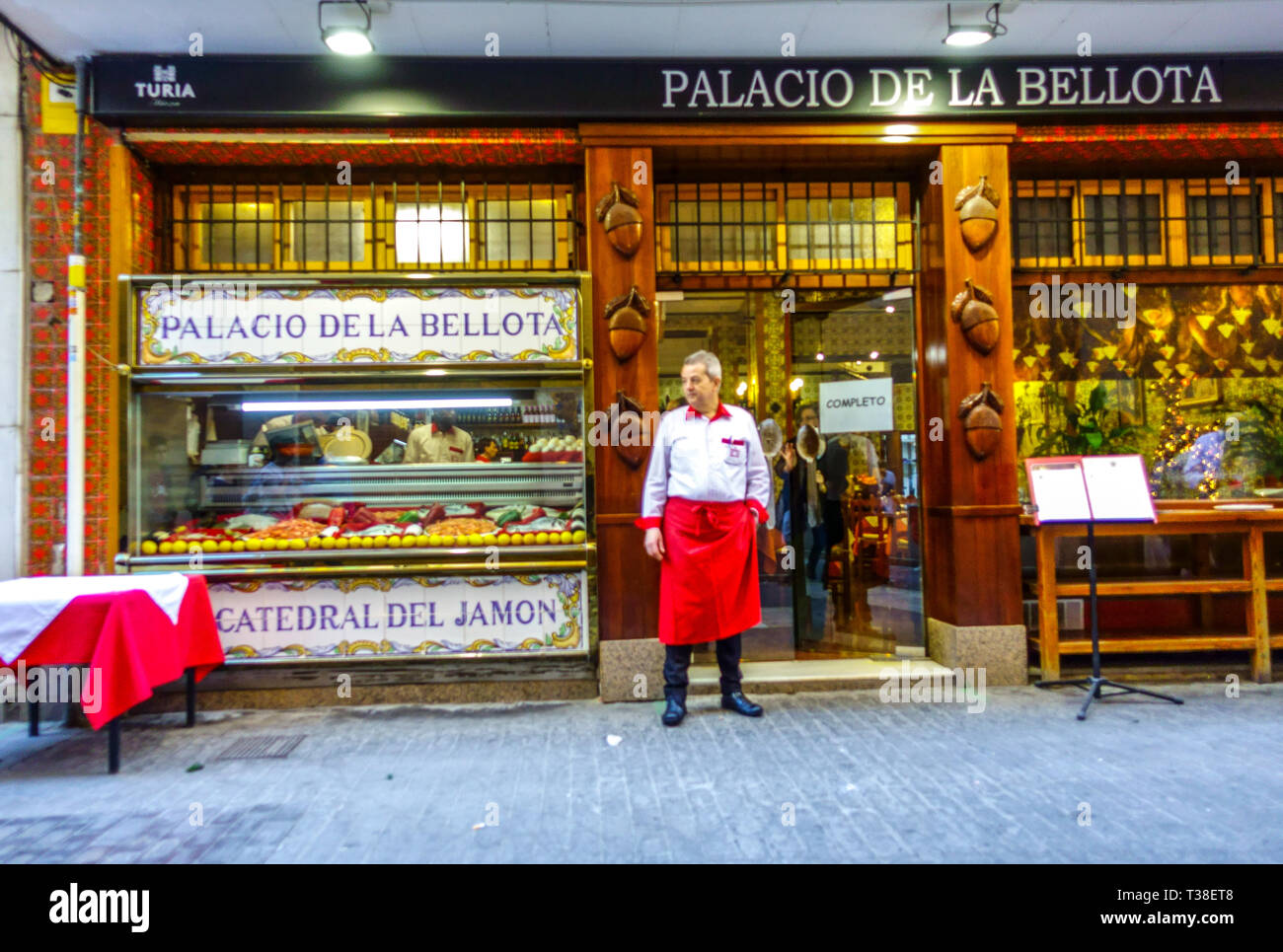 The waiter looks for customers, the Palacio de la Bellota, Valencia Restaurant Spain Europe Stock Photo