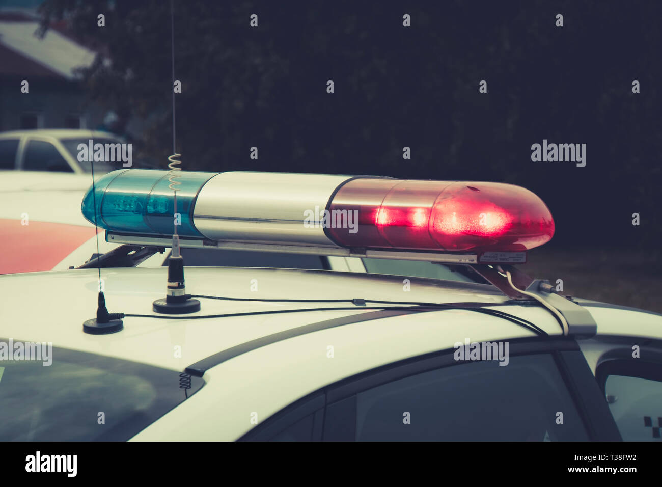 Close up of a swithched rotating beacon of a police car. The top of the