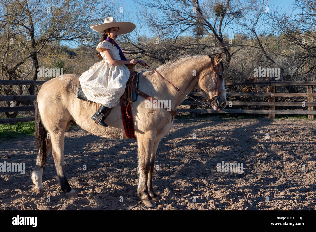 Latina riding cowgirl