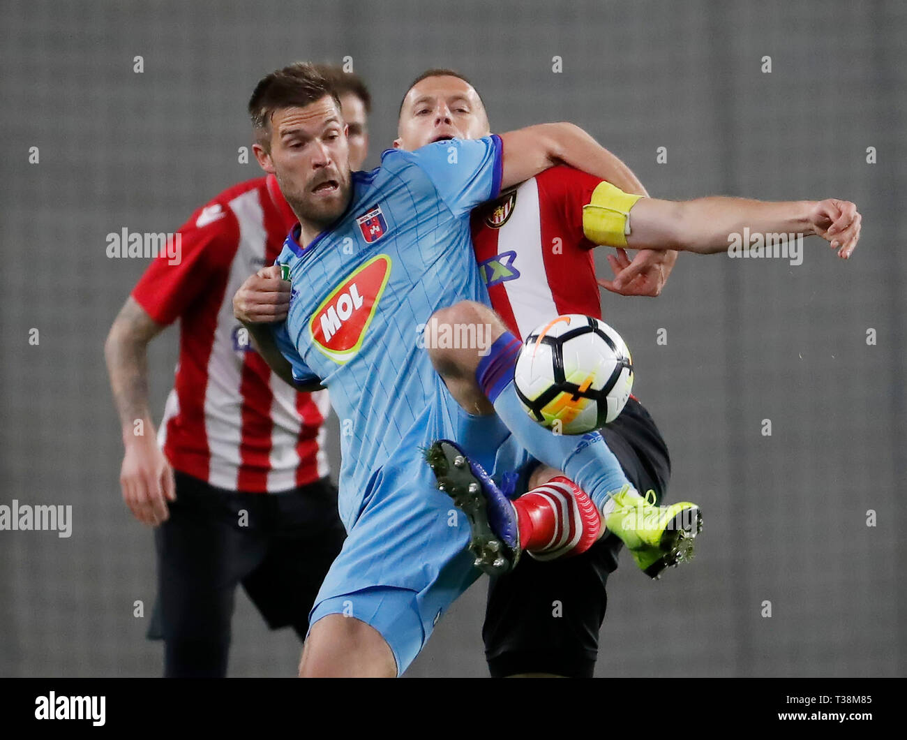 BUDAPEST, HUNGARY - APRIL 6: (l-r) Marko Futacs of MOL Vidi FC fights for the ball with Djordje Kamber of Budapest Honved during the Hungarian OTP Bank Liga match between Budapest Honved and MOL Vidi FC at Nandor Hidegkuti Stadium on April 6, 2019 in Budapest, Hungary. Stock Photo