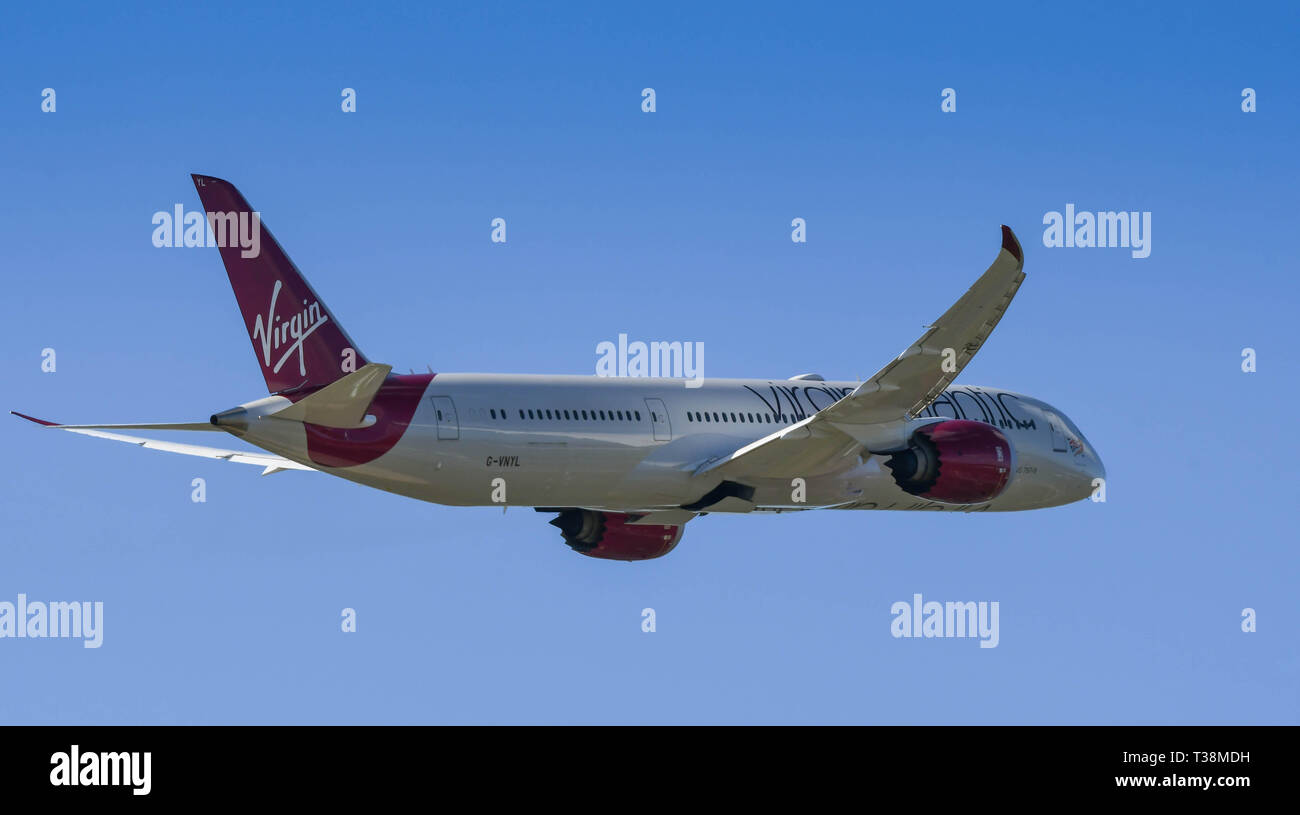 LONDON, ENGLAND - MARCH 2019: Virgin Atlantic Boeing 787 Dreamliner climbing after take off from London Heathrow Airport Stock Photo