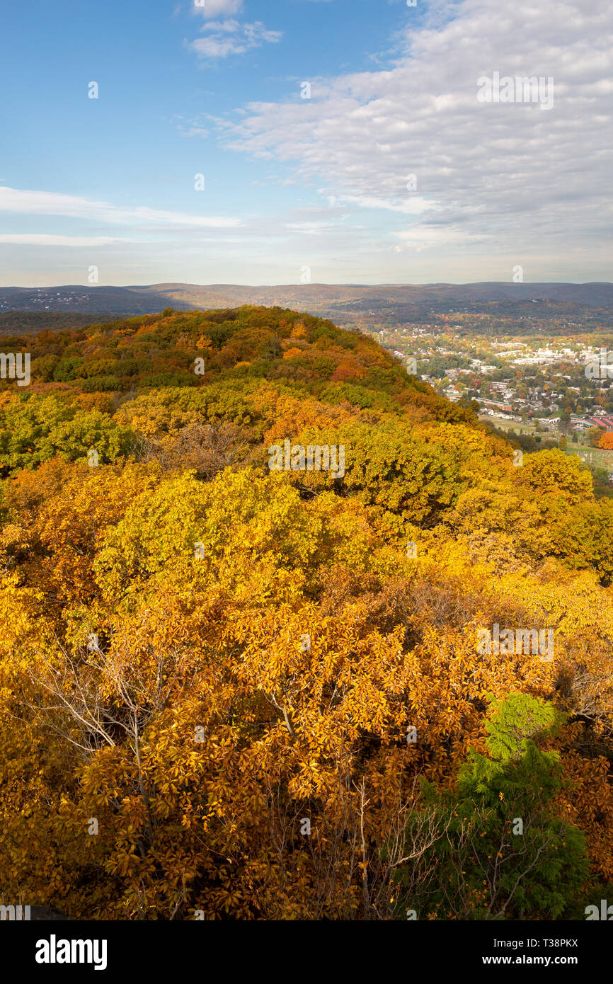 Fall colors covering the Hudson River Palisades as they wind past the