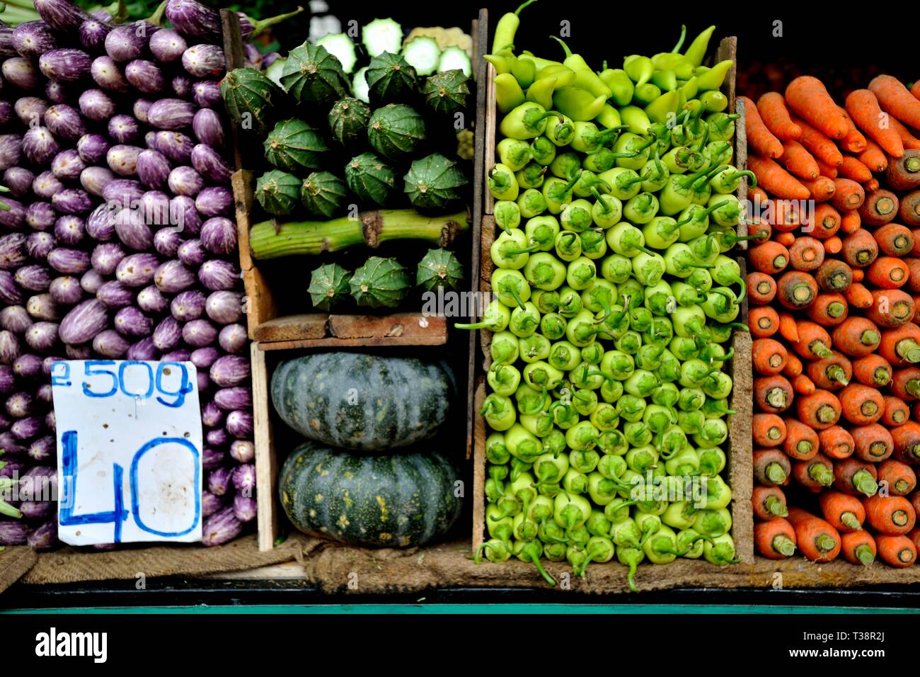 Display of a variety of colourful fresh vegetables on sale in Kandy  market, Sri Lanka Stock Photo