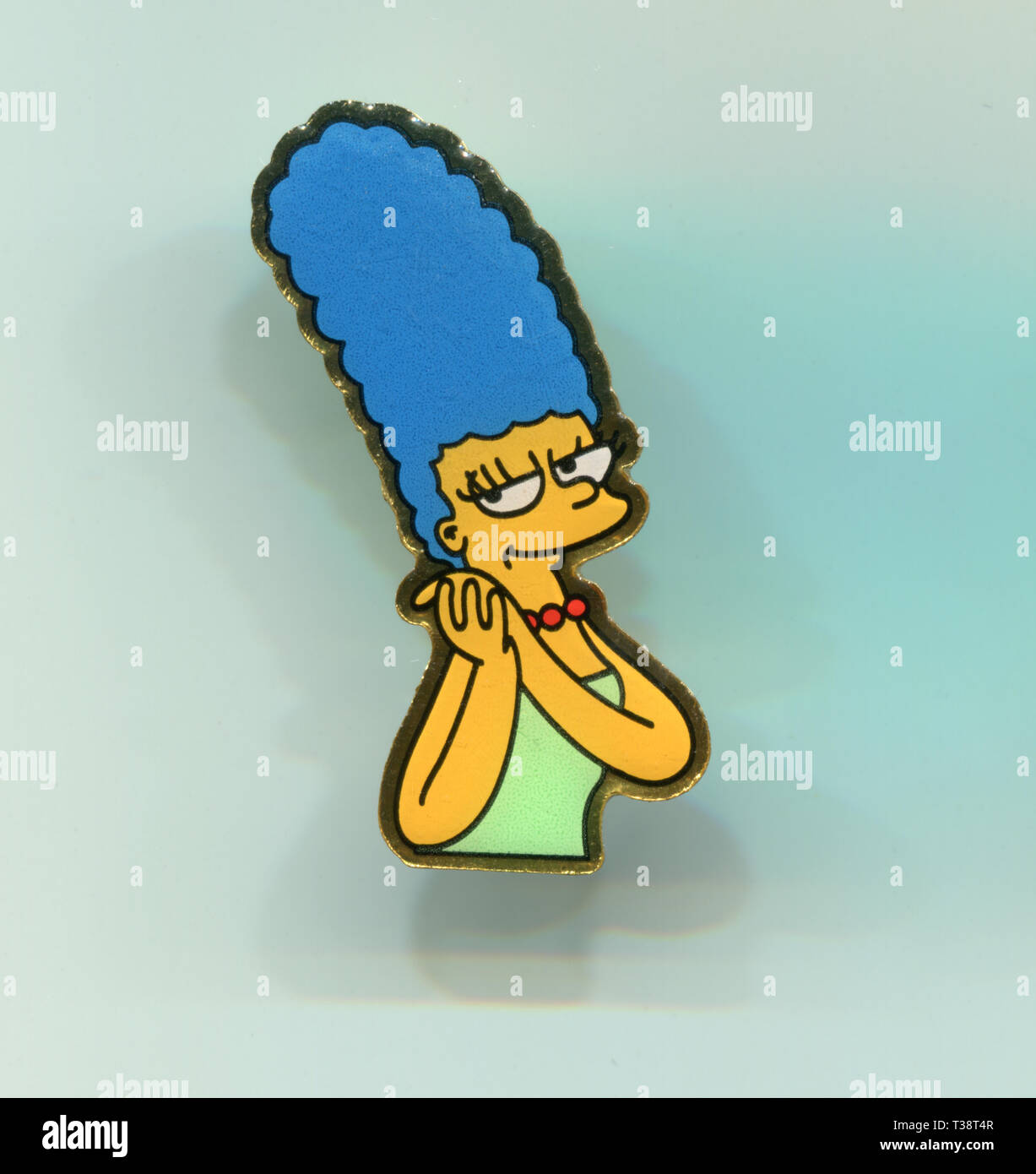 Italy - 1990s: Simpsons characters on pin badge collection, Marge Simpson Stock Photo