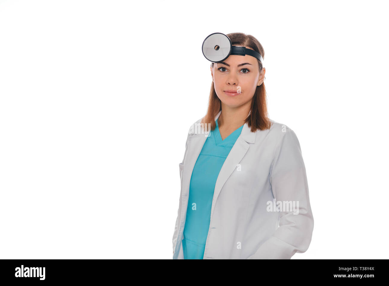 Portrait smiling otolaryngologist doctor with medical mirror on head isolated on white Stock Photo