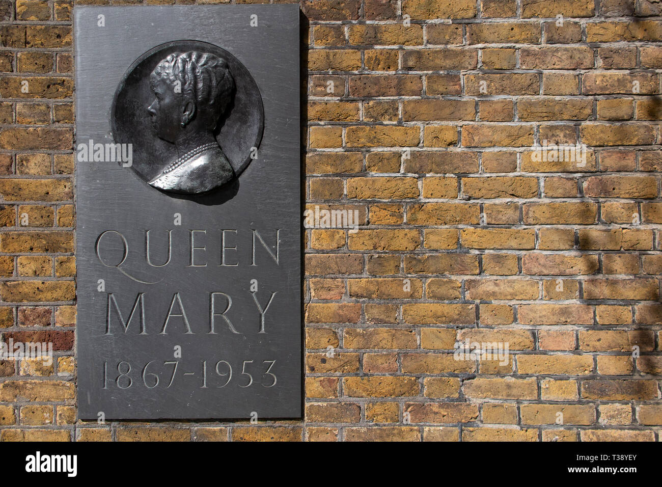 A brass plaque in memory of Queen Mary in Central London at Marlborough House Stock Photo