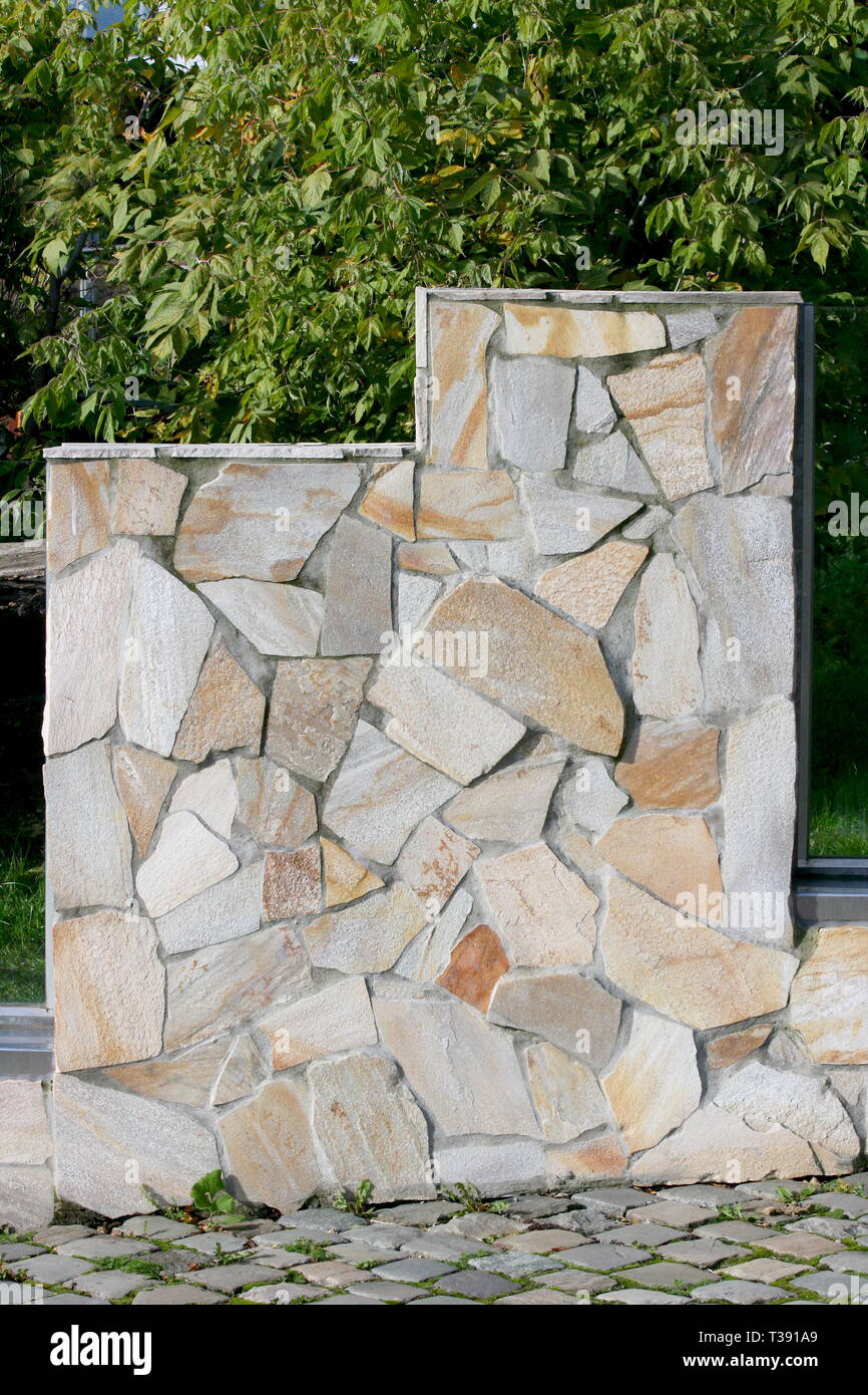Section of a wall of natural stones Stock Photo