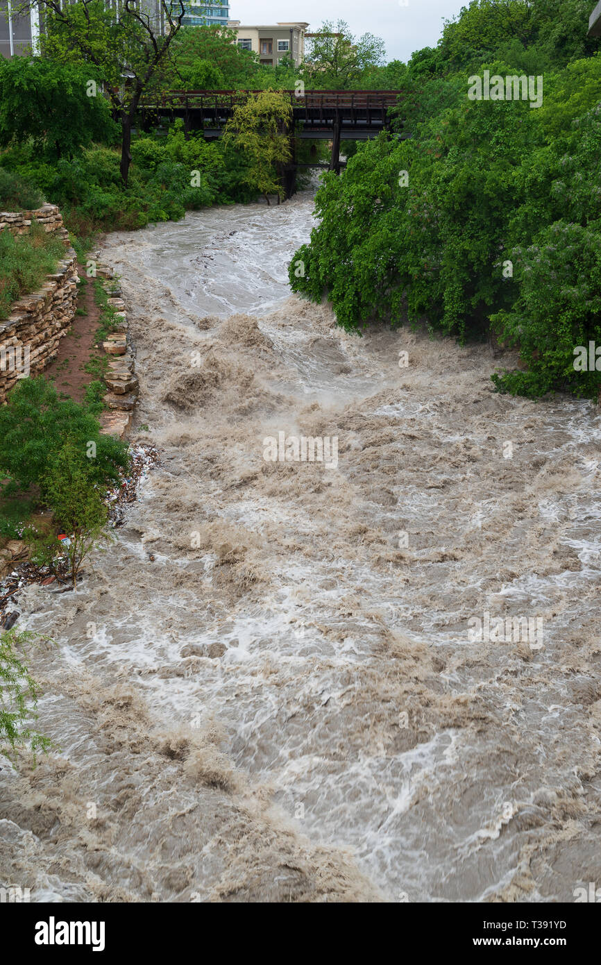 Major storms and heavy spring rains on April 6th, 2019, in central Texas cause heavy flooding to Shoal Creek in downtown Austin. Stock Photo