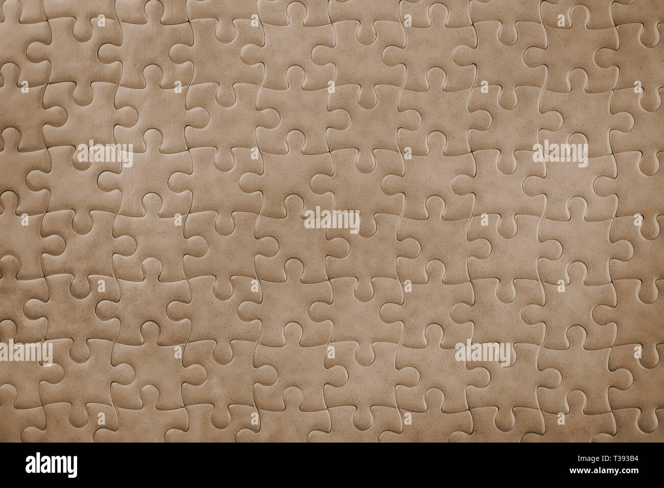Dark bronze blank puzzle close up. Background and texture Stock Photo Alamy