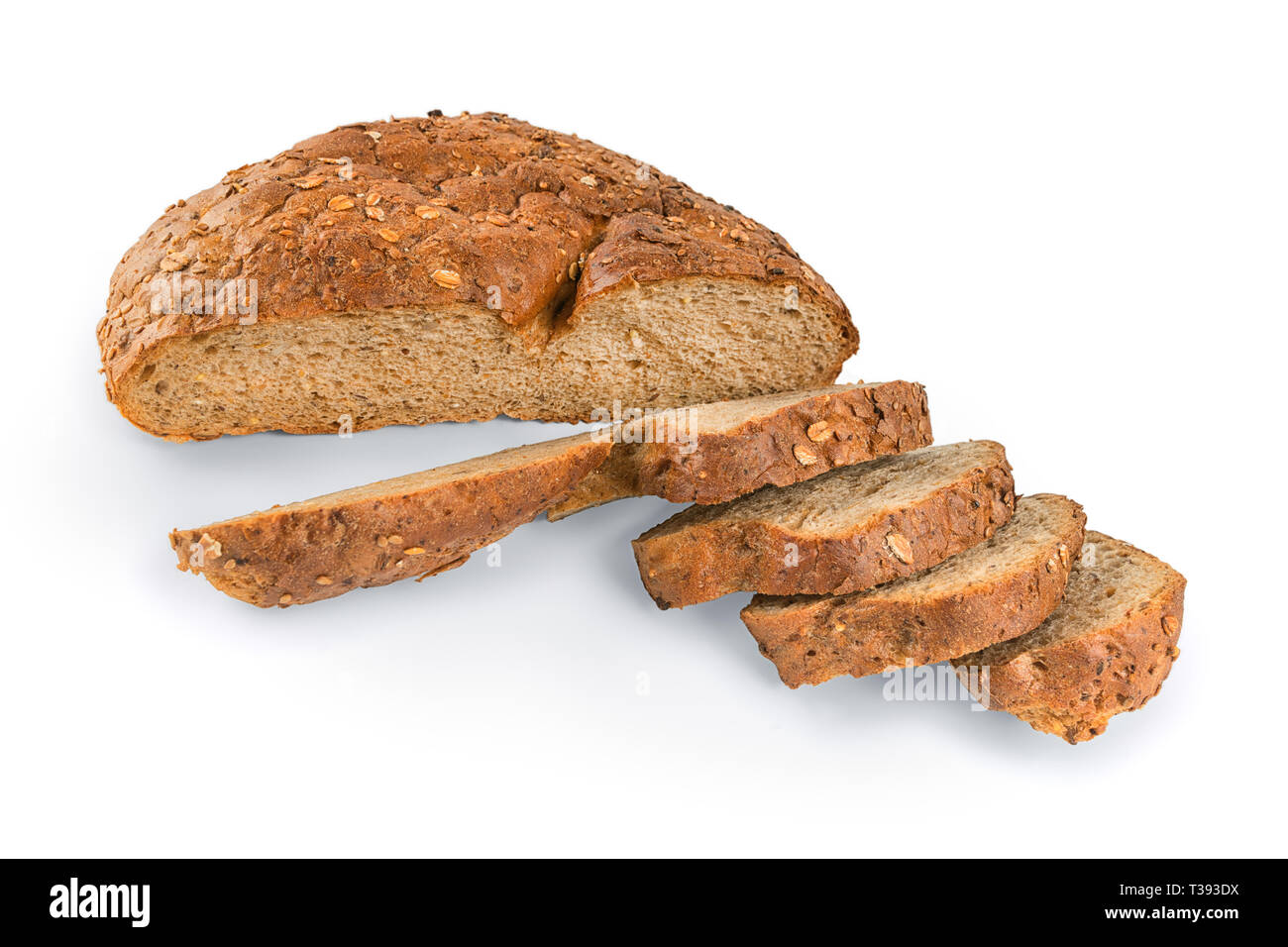 Round freshly baked brown rye round bread with slices. Wide angle view isolated on white