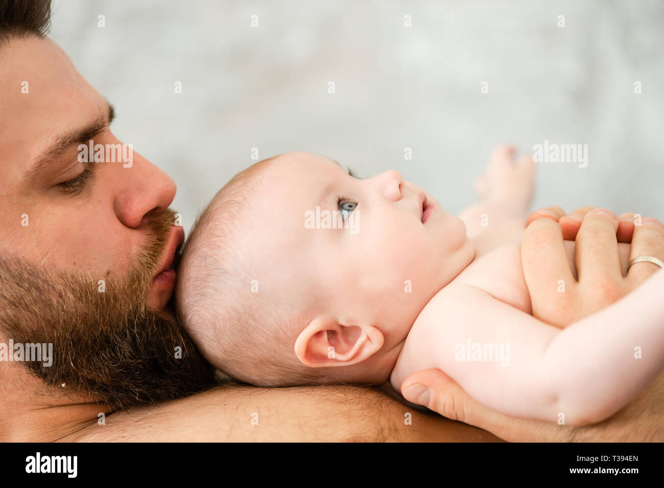 Loving Dad Kiss Crown Of His Infant Baby Stock Photo Alamy