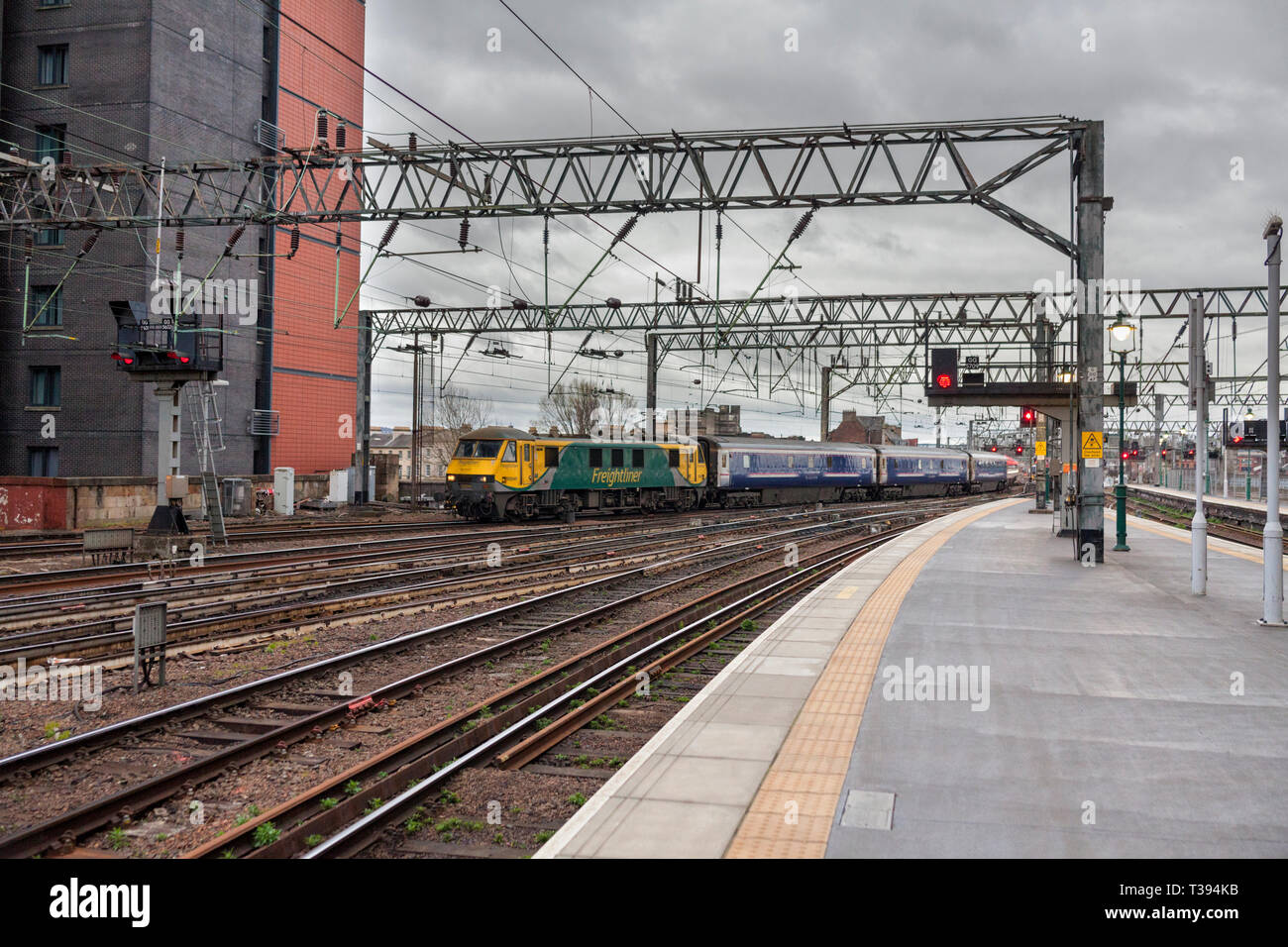 The 2353 London Euston to Glasgow Central Caledonian sleeper train arriving at Glasgow central