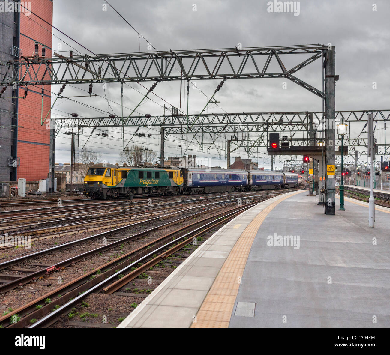 The 2353 London Euston to Glasgow Central Caledonian sleeper train arriving at Glasgow central