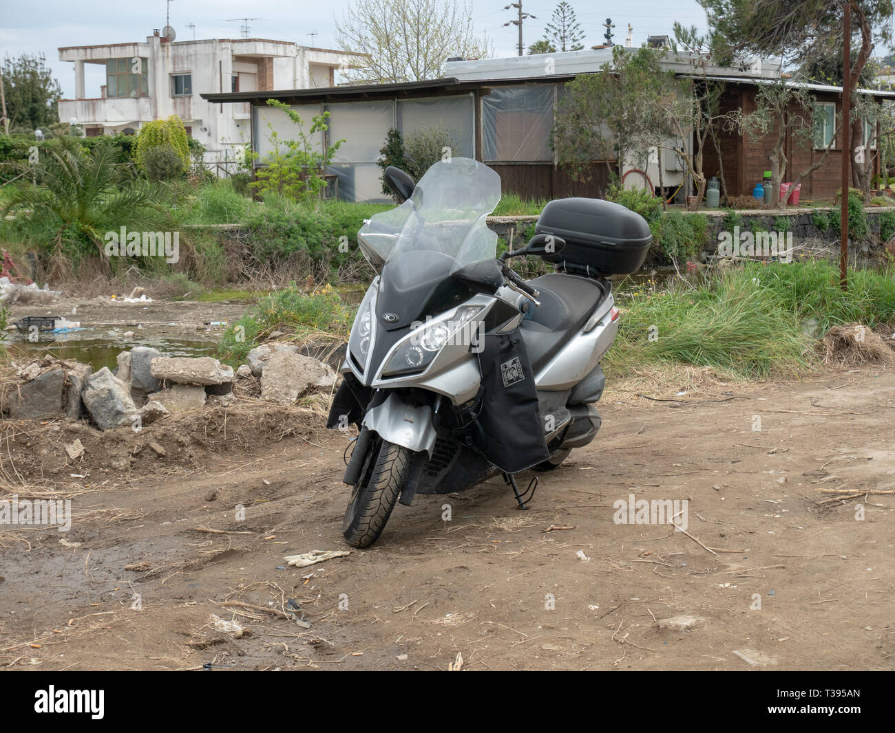 Commuter scooter, used and abused. with top box, windscreen, sleeve Stock  Photo - Alamy