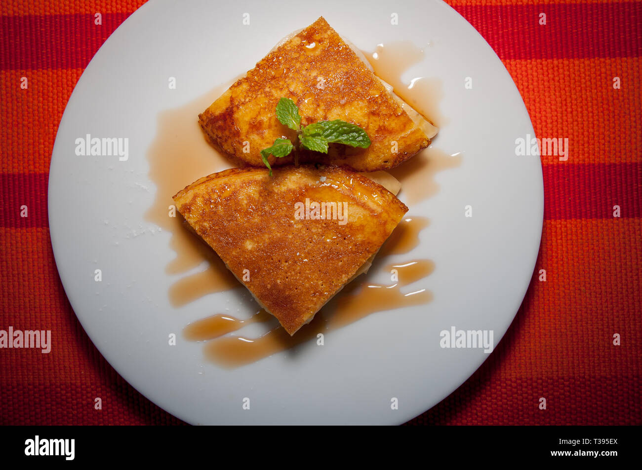 Pancakes on white plate Stock Photo