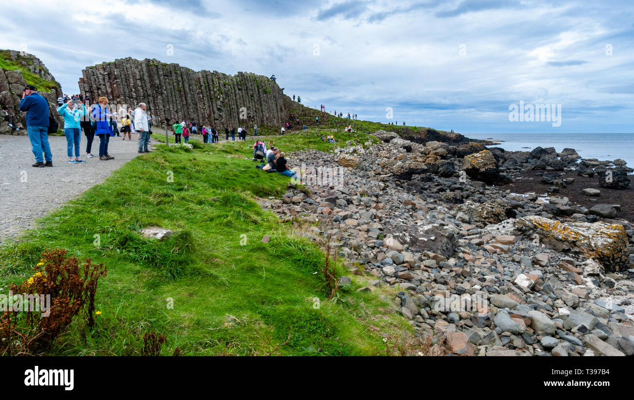 Tourists at the Giant's Causeway in Bushmills Northern Ireland Stock ...