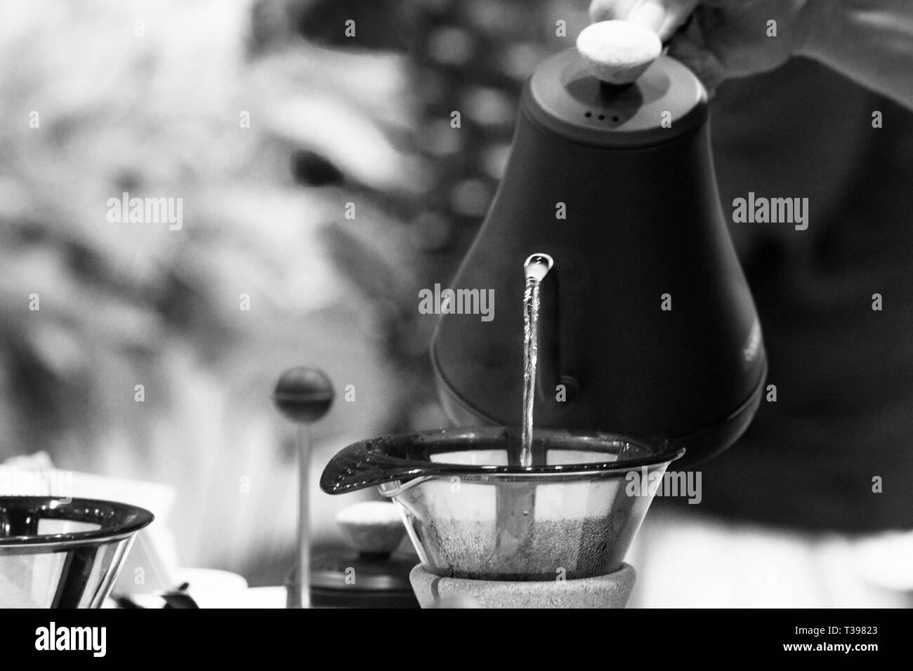 Barista is making coffee, coffee preparing with chemex, Chemex Dripping hot fresh coffee Stock Photo