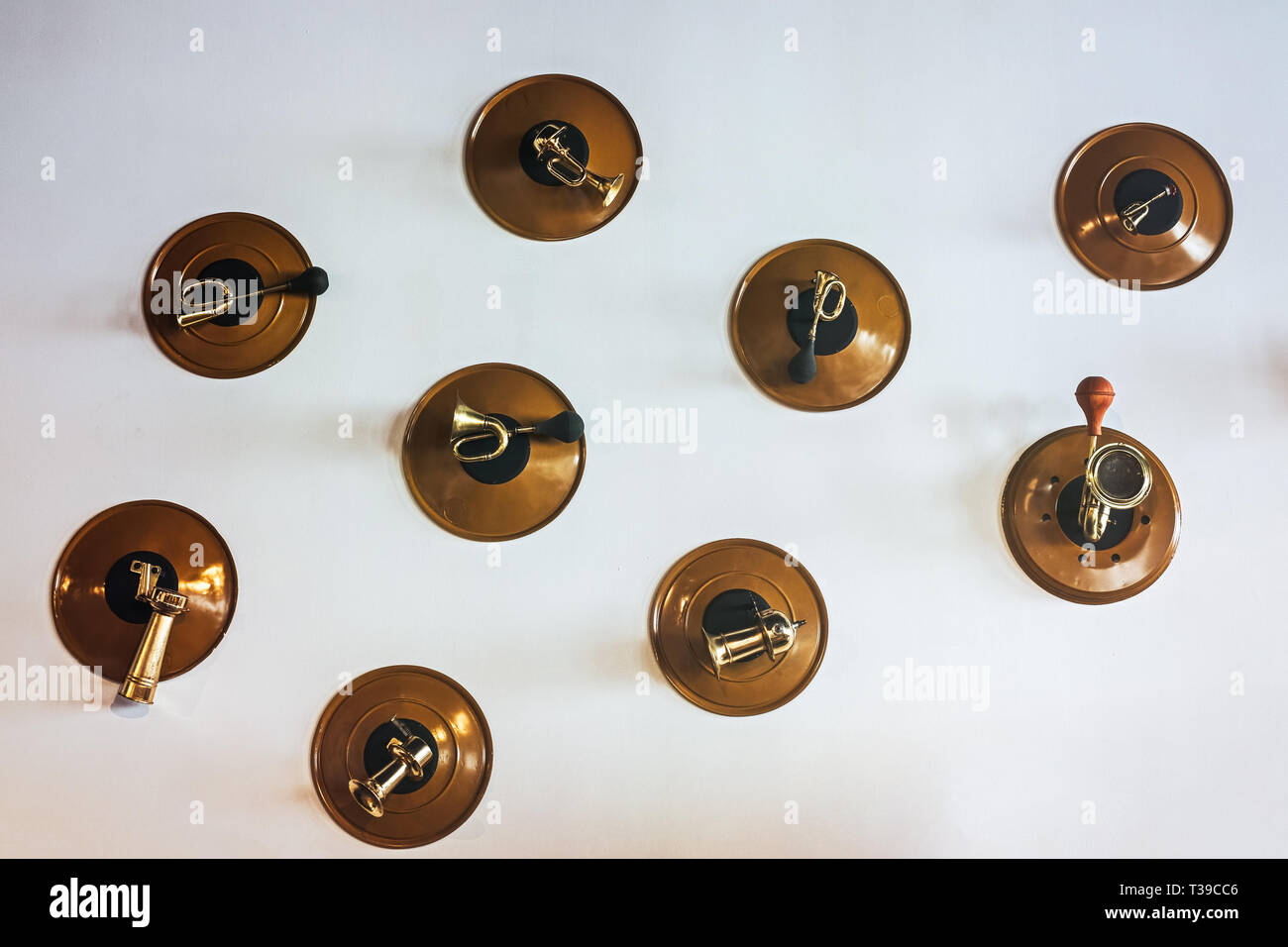 vintage car horns caught on the wall Stock Photo Alamy