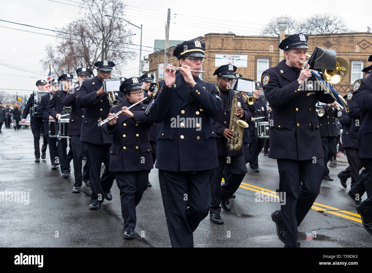 Men & women of the NYPD Marching Band at the Hindu Holi Parade in Richmond Hill, Queens, New York. Stock Photo