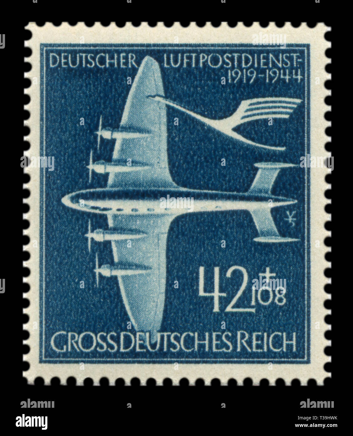 German historical stamp:  25th anniversary of the German postal air service. Four-engine huge Junkers plane Ju 90 'Der Große Dessauer',  airmail, 1944 Stock Photo